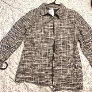 Jacket. Has a little sparkle to it. Still has tags.